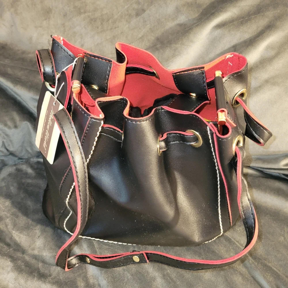 Mellow World Black Bucket Purse Red Fabric Lining Snap Closure Dooney Lookalike